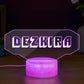 Custom DEZKIRA gaming LED sign, white text on clear acrylic, purple base, perfect gamer gift and room decor.